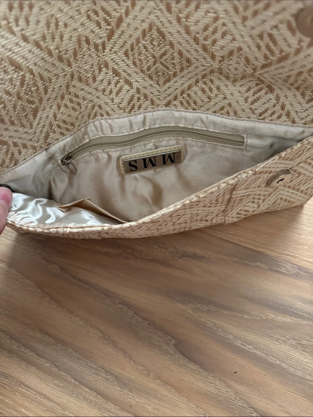 MMS woven clutch